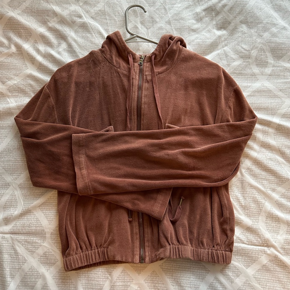 Brown cropped jacket. Feels like velvet/has pockets + hoodie. Flared sleeves